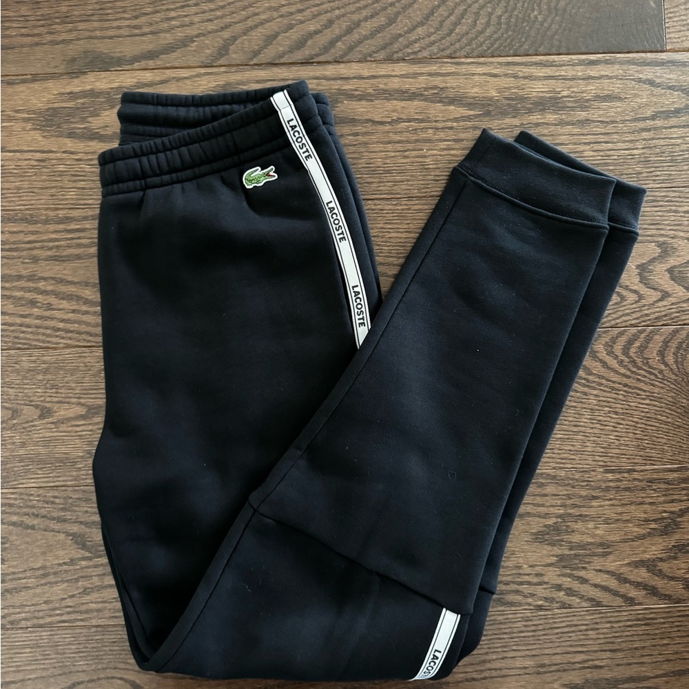 Lacoste Black Sweatpants with Tapered Legs and White Stripes